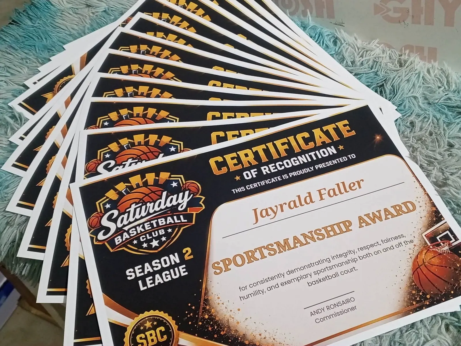 A fan of printed basketball sportsmanship certificates